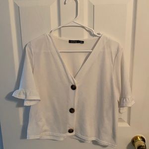 Cute button down too with ruffle sleeves